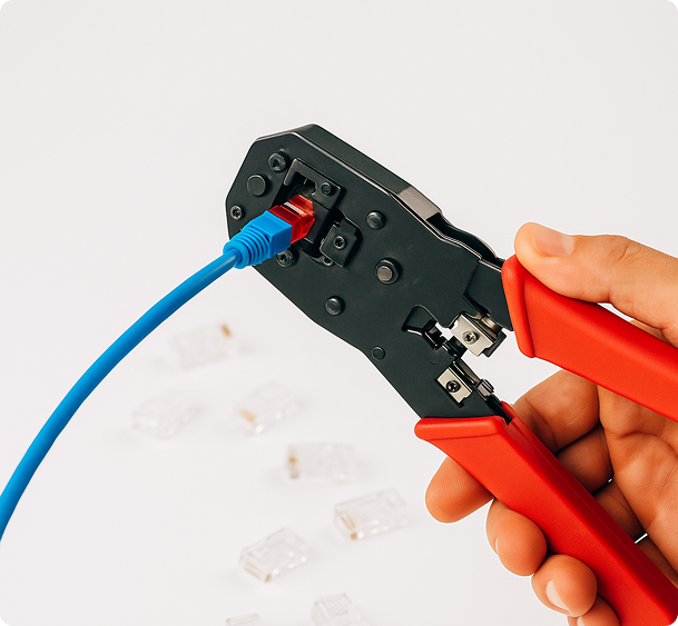 Electrician crimping a network cable